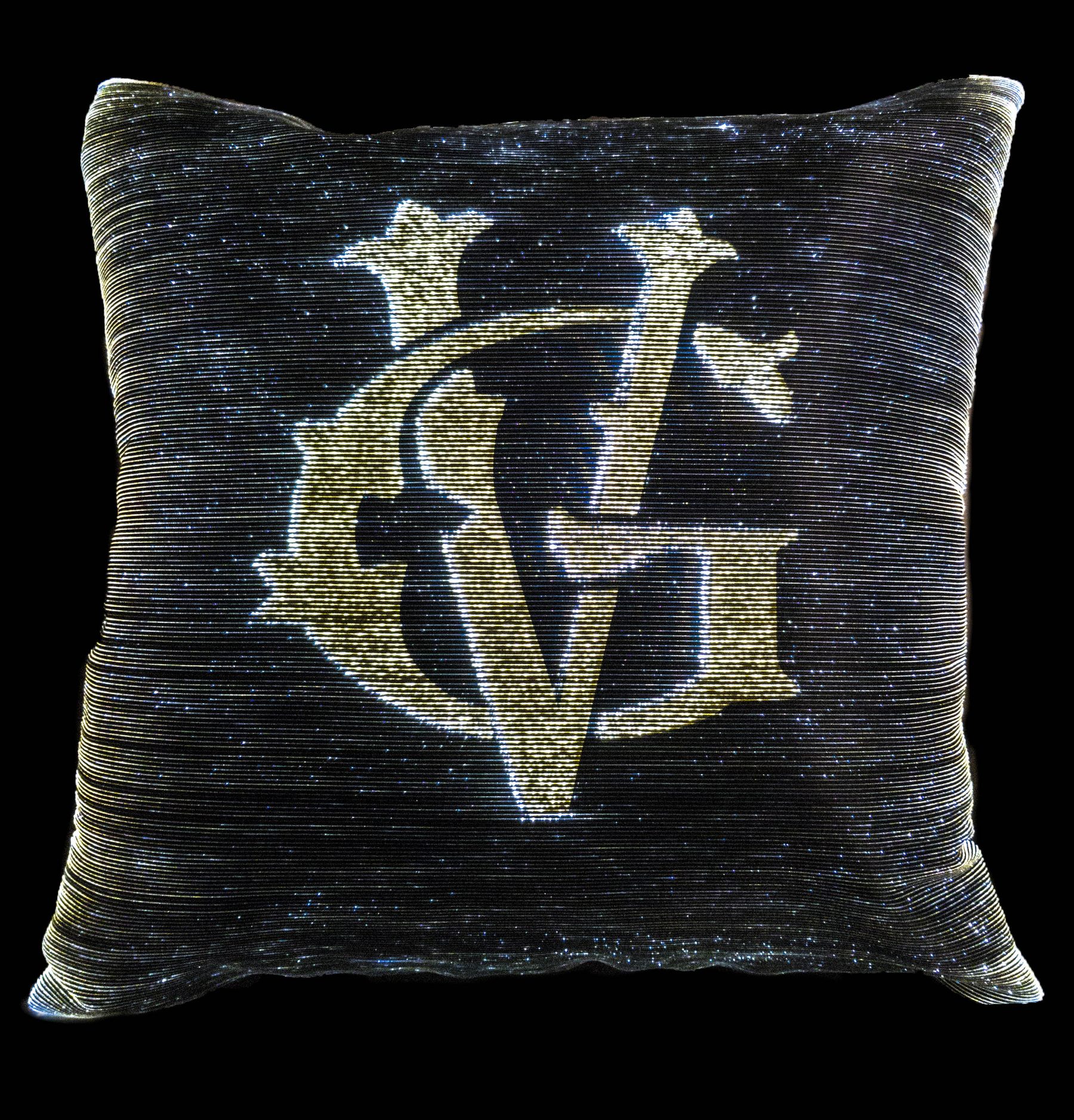 Cushion with an illuminated woven monogram